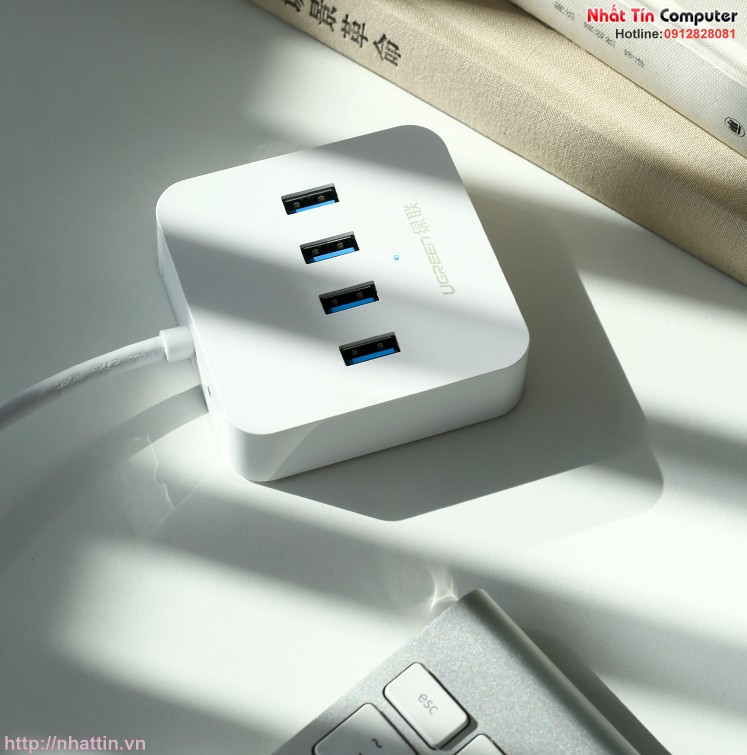 bo-chia-usb-3-0-ra-4-cong-ho-tro-dc-5v-2a-dai-1-5m-chinh-hang-ugreen-30221